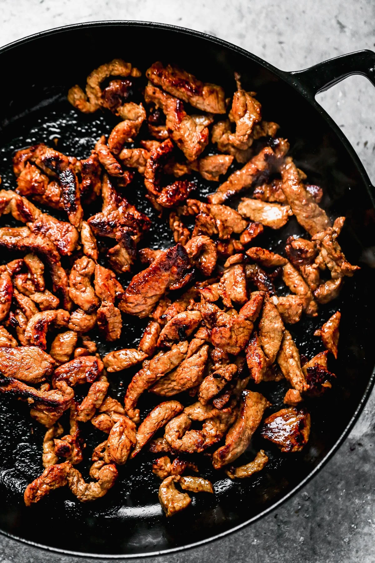 Cook pork tenderloin in cast iron skillet. 