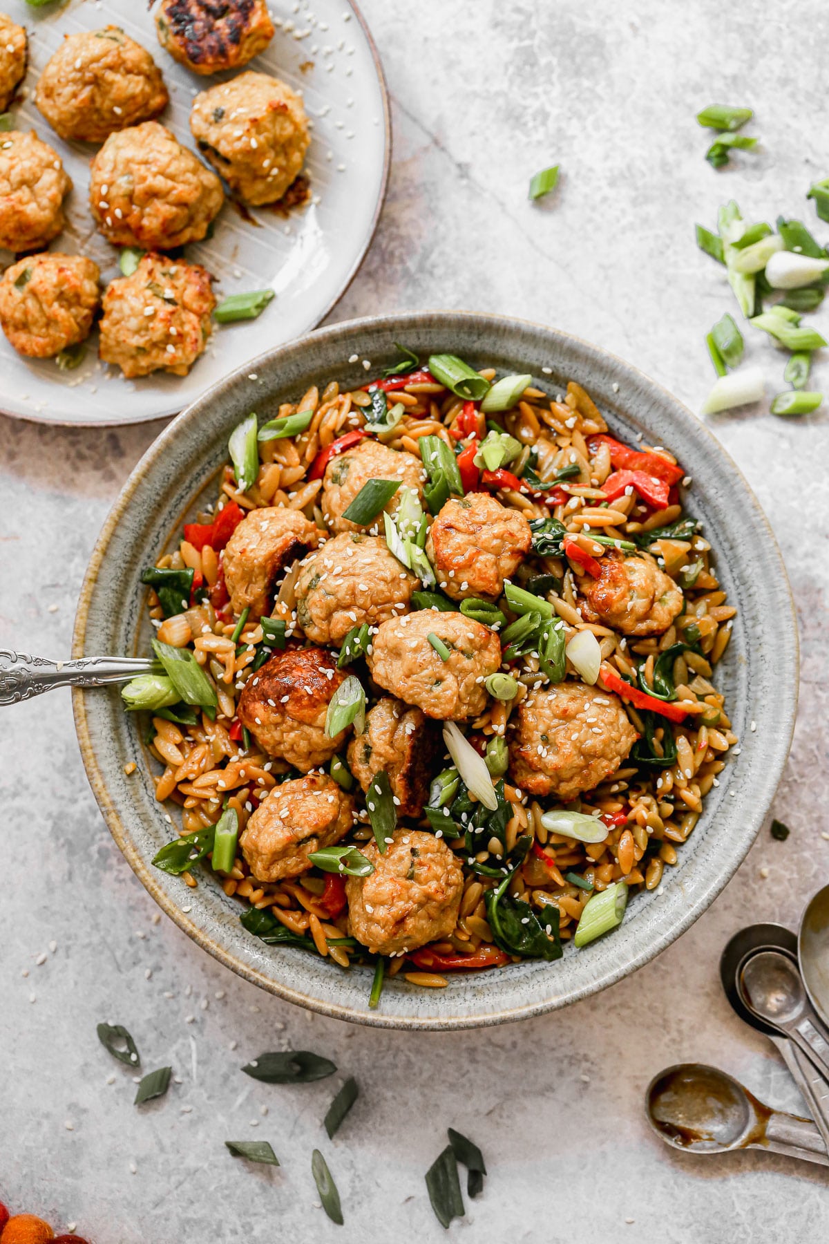 Our current favorite was to do meatballs: Asian Chicken Meatballs with Saucy Sesame and Hoisin Orzo. This fun spin on a classic pairs tender, garlic and ginger BAKED meatballs with an orzo full of veggies and an addictive sauce you'll want to lick with the a spoon. Prep ahead and eat later in the week!&nbsp;