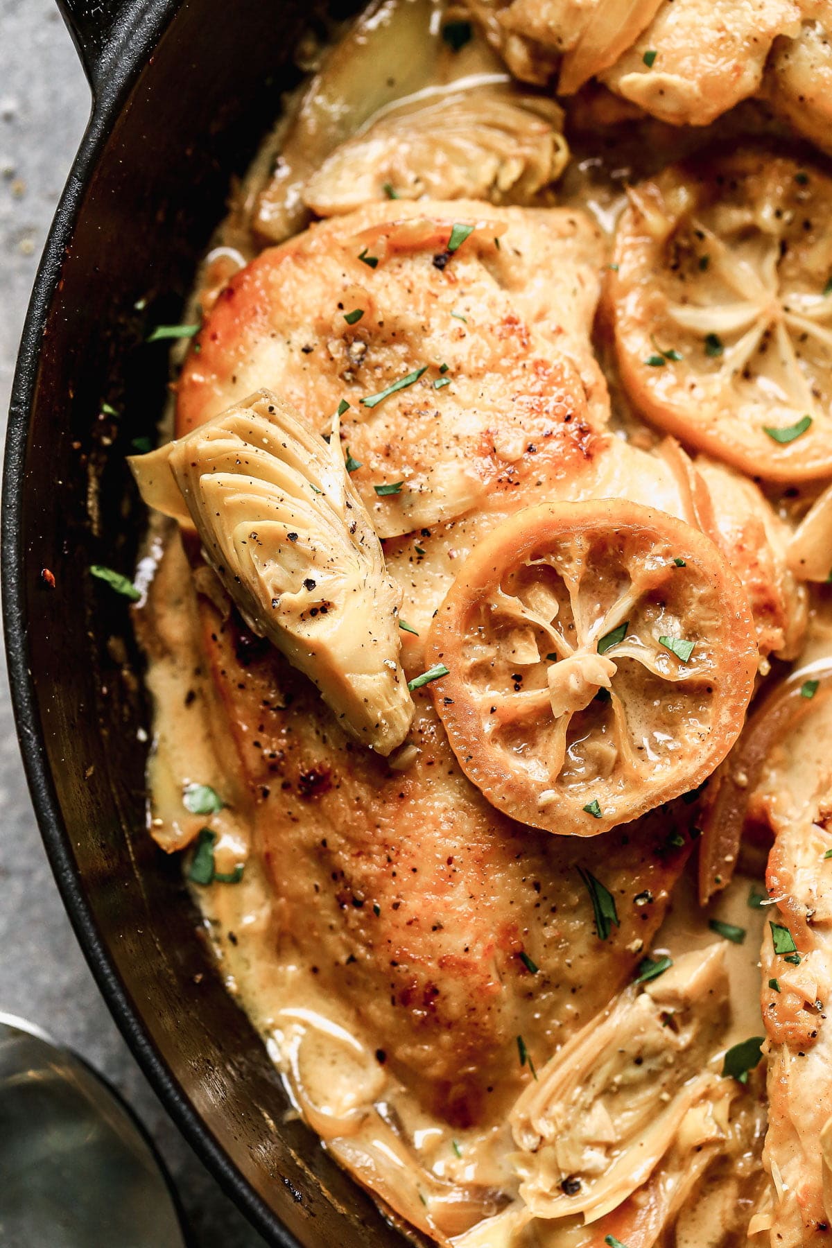 Swimming in a luscious lemon-infused wine sauce and studded with briny artichokes and sweet caramelized onions, our Chicken with Artichokes is the perfect bright springy dish to whip up when we also need a little cozy for those curve ball cold days we all get this time of year.&nbsp;