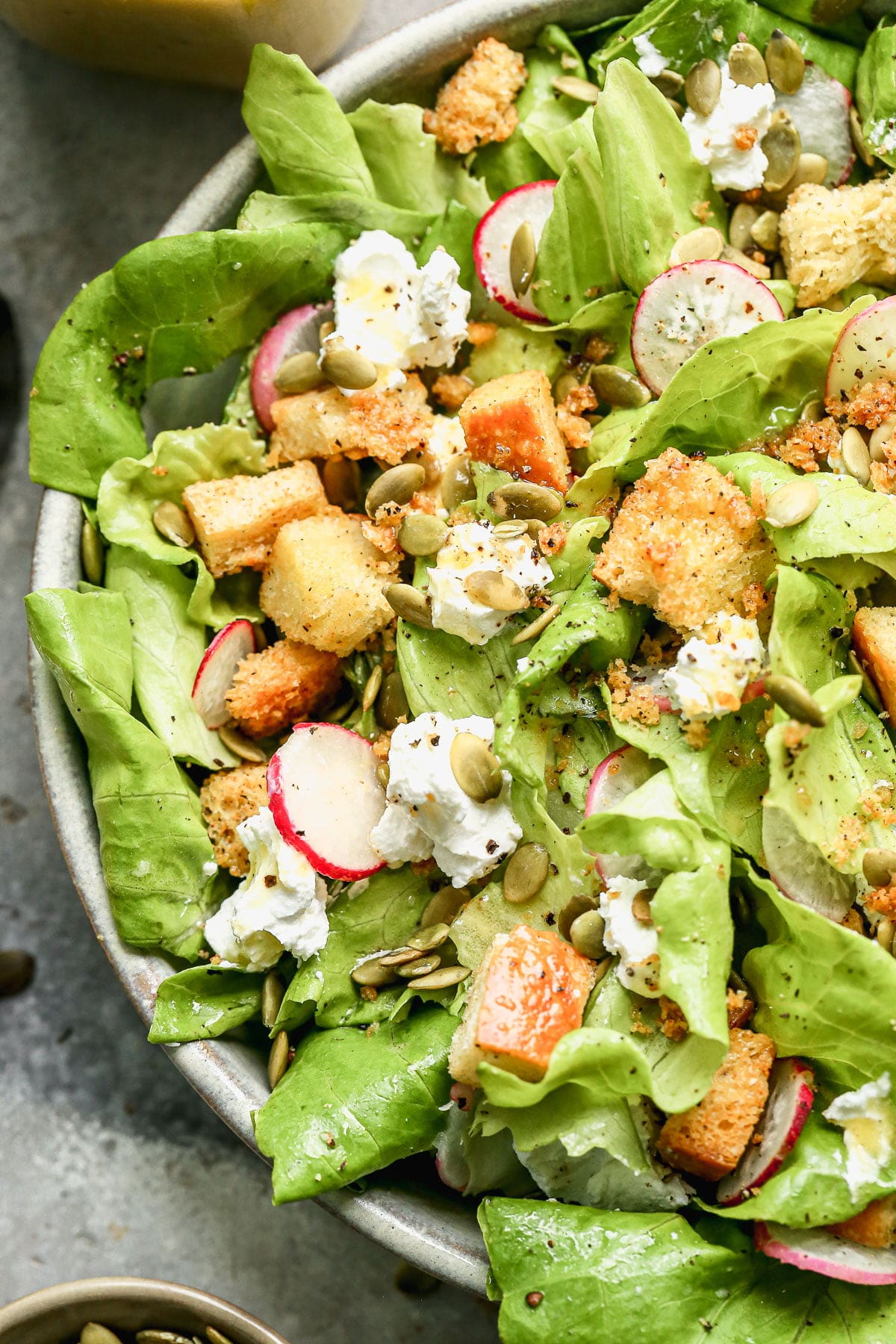 Summer is upon us and so are light, refreshing, seasonal salads. Brimming with homemade croutons, creamy goat cheese, crunchy pepita seeds, and crisp radish, our Butter Lettuce Salad is an easy side dish we come back to time and time again. Prep the dressing and croutons at the beginning of the week and enjoy a little bit every day.&nbsp;