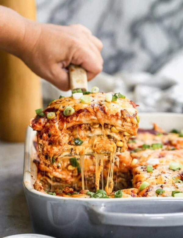 Packed with ground chicken or turkey, plenty of veggies, and an easy homemade enchilada sauce, our Chicken Enchilada Casserole is the perfect way to get your enchilada fix in an easier form. Make a day in advance and pop in the oven when you're ready to eat. 