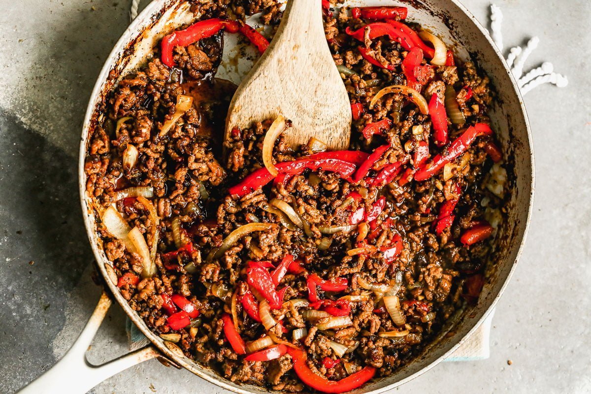 Brimming with saucy ground beef, chewy rice noodles, and plenty of veggies, our Spicy Beef Noodles are the perfect way to get dinner on the table fast and without complaint. These guys are equal parts sweet, spicy, and delicious and we can't get enough of them. Perfect way to use up leftover ground beef and veggies.