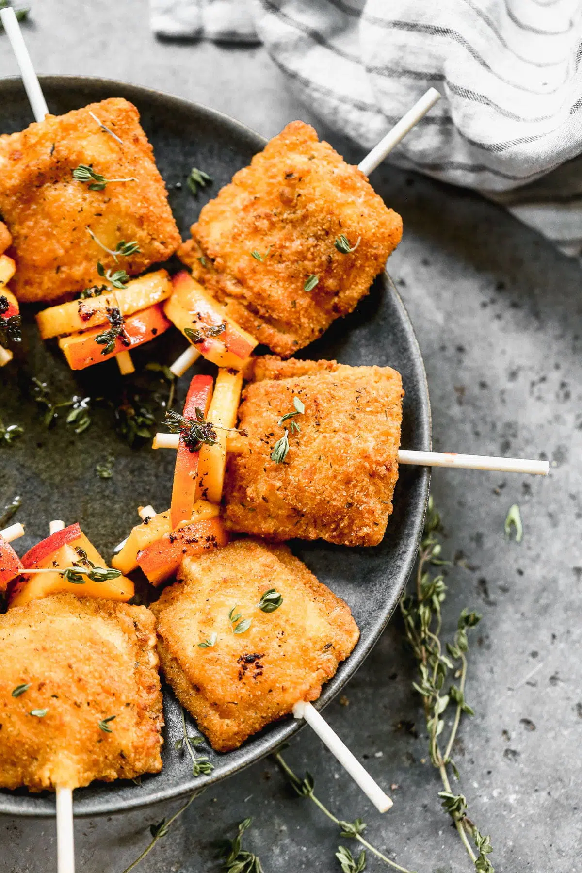 Cocktail hour just got infinitely easier and more delicious with our Peach Toasted Ravioli Pops. We throw crispy ravioli on a cocktail stick with the ripest summer peaches, drizzle each one with brown butter and thyme infused honey and serve it up with our favoirte chilled rose.