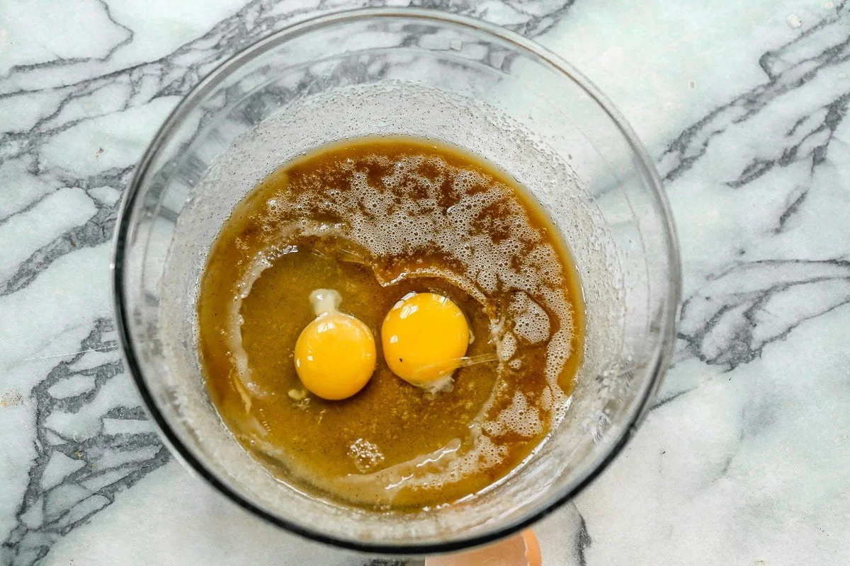 Beat eggs with sugar and butter