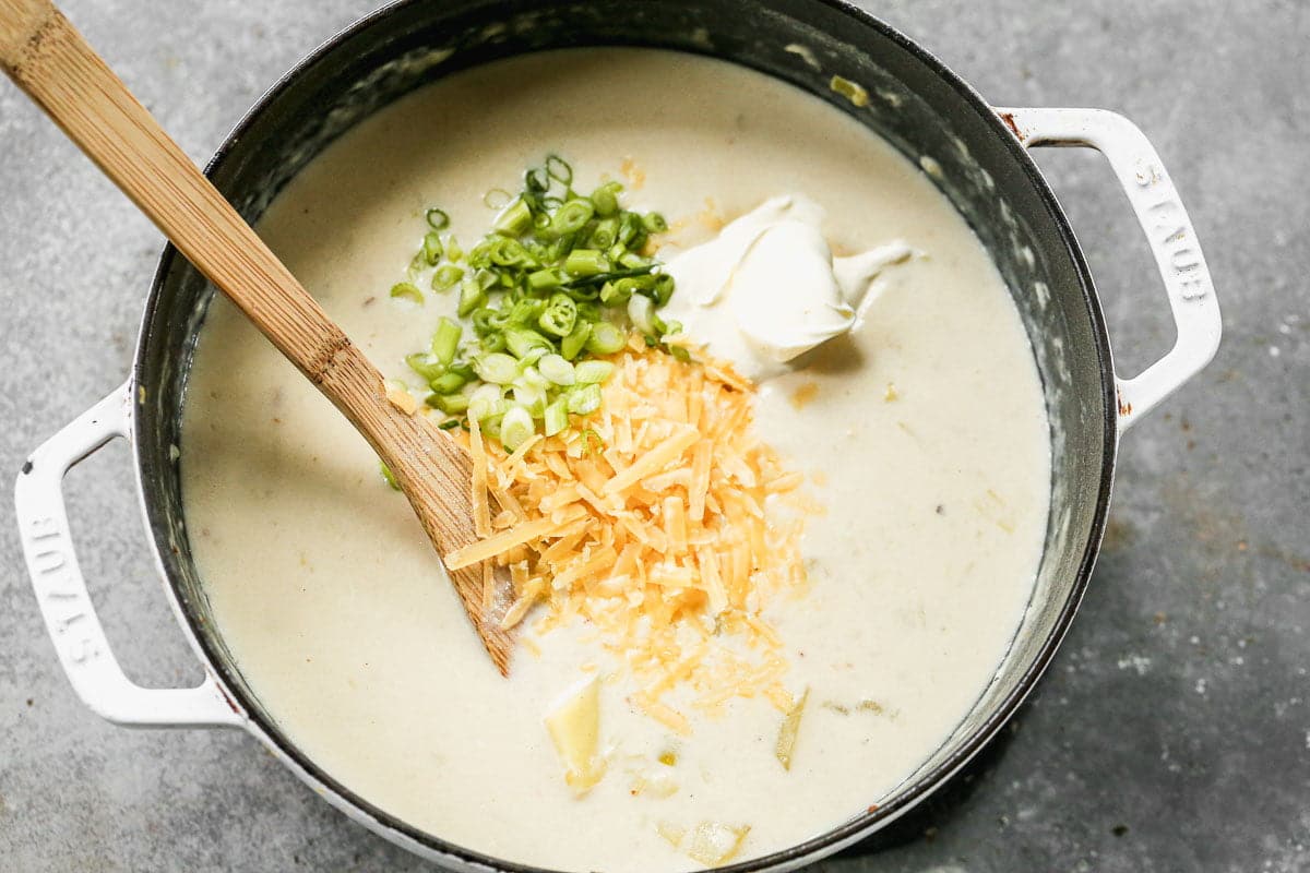 Cheesy potato soup with green onion, gouda and cheese. 
