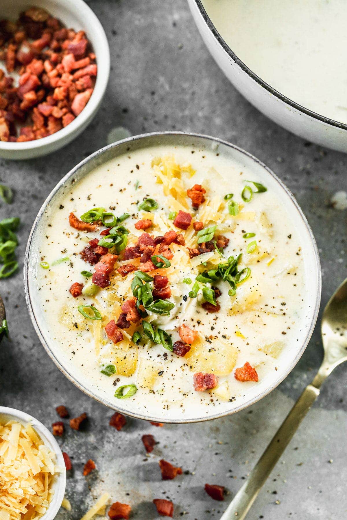 With many of the same notes as the classic, Cheesy Potato Soup is basically an elevated version of classic baked potato soup but BETTER. We swap out cheddar for aged gouda, throw in sweet leeks, tangy crème fraîche and salty pancetta for an updated version we're obsessed with. 
