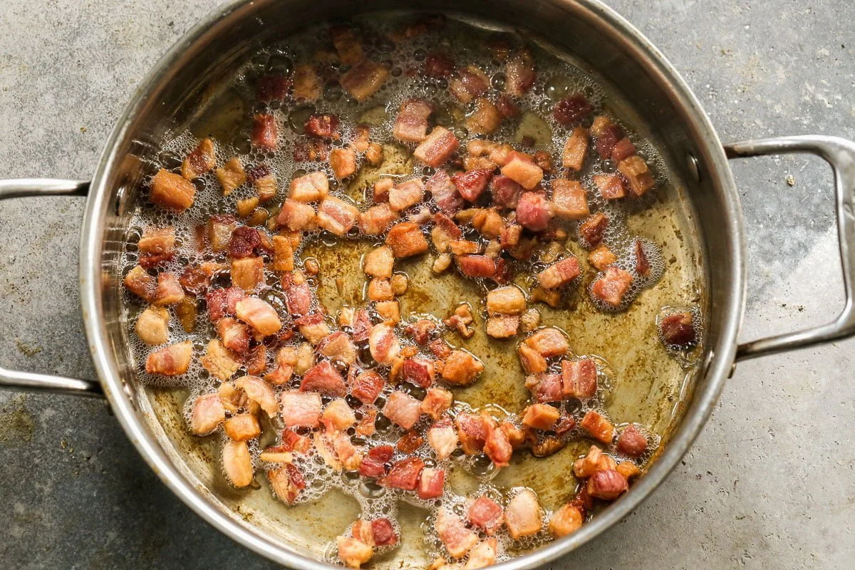 Render pancetta until crisp in large skillet