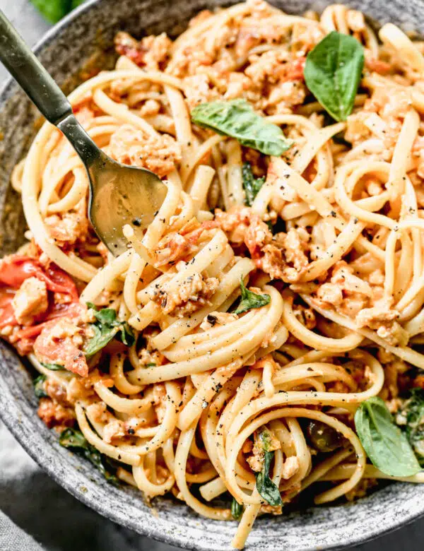 Summery Chicken Ragu is a lighter take on a traditional bolognese but echos the same fundamentals with plenty of veggies and a tomato-based sauce. We use fresh cherry tomatoes, tangy goat cheese and ground chicken to make sure you finish this meal still light on your toes.