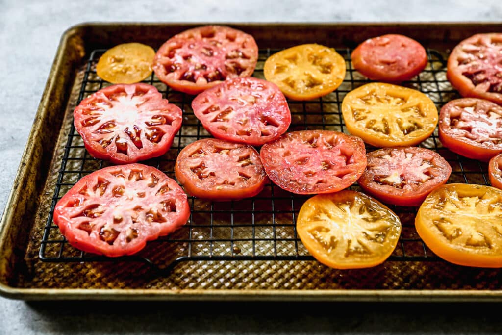 Tomatoes sprinkled with salt to let out the moisture. 