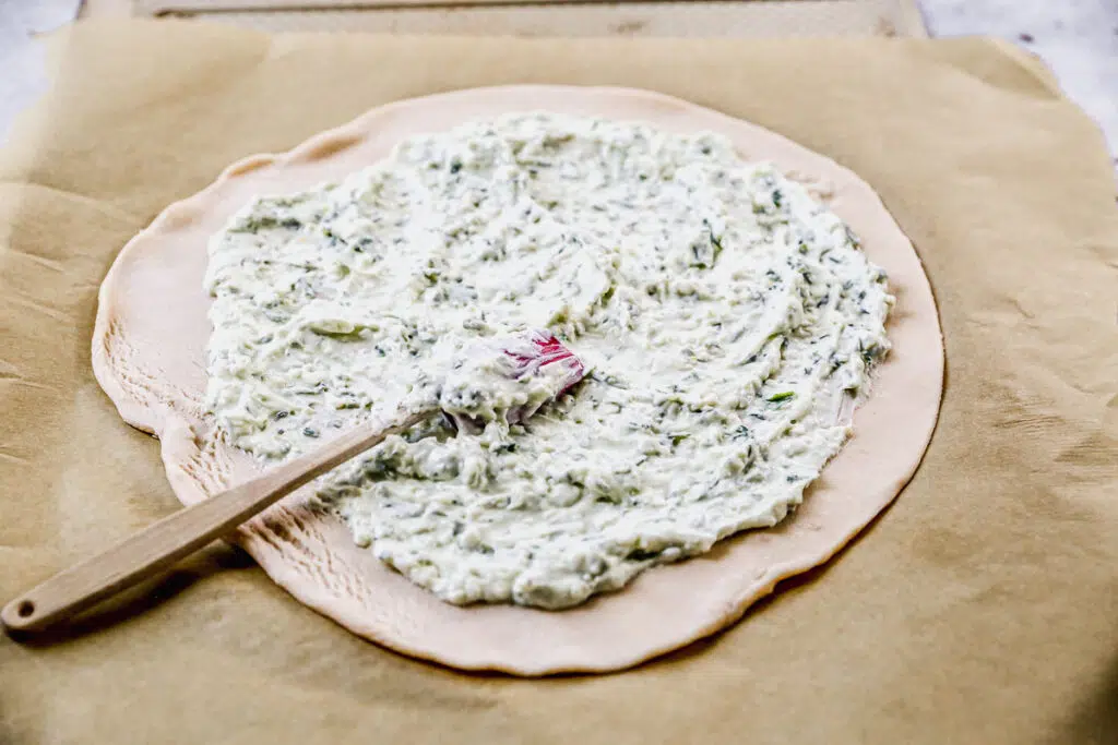 Ricotta filling spread on pie crust