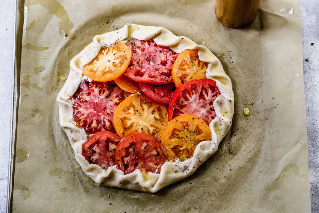 Tomatoes layered in a pie crust