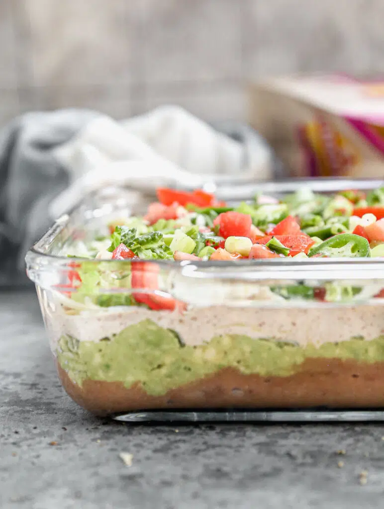 While at first glimpse our Seven Layer Dip looks like a version you'll find loitering in the prepared foods section, each component of this classic is packed with flavor beyond what you kind find anywhere else.