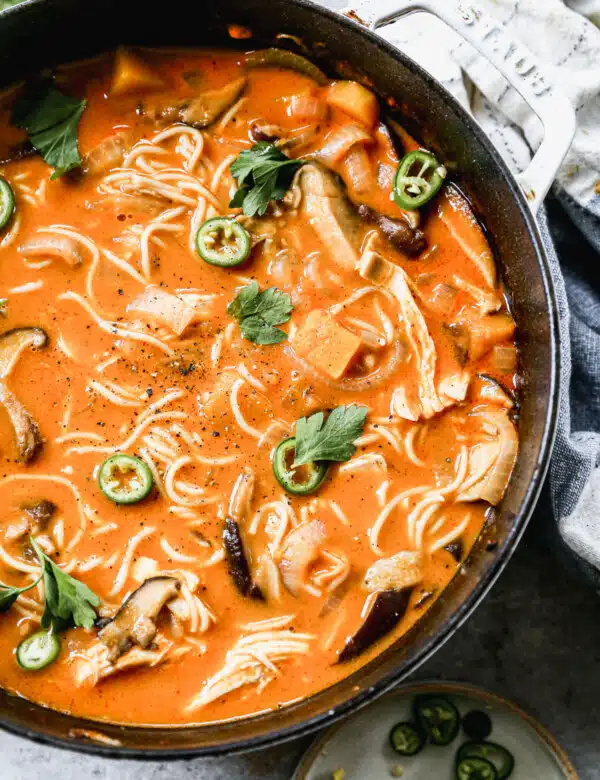 This Pumpkin Curry Ramen Recipe is packed with red curry paste, creamy coconut milk, and hints of pumpkin puree. We had heartiness with shiitake mushrooms, shredded chicken and plenty of sweet butternut squash.