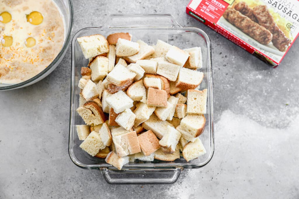 Cubed day old bread in baking dish