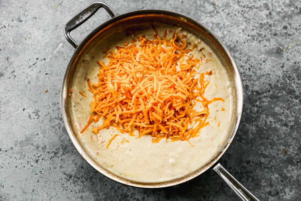 Sharp cheddar cheese in cheese sauce