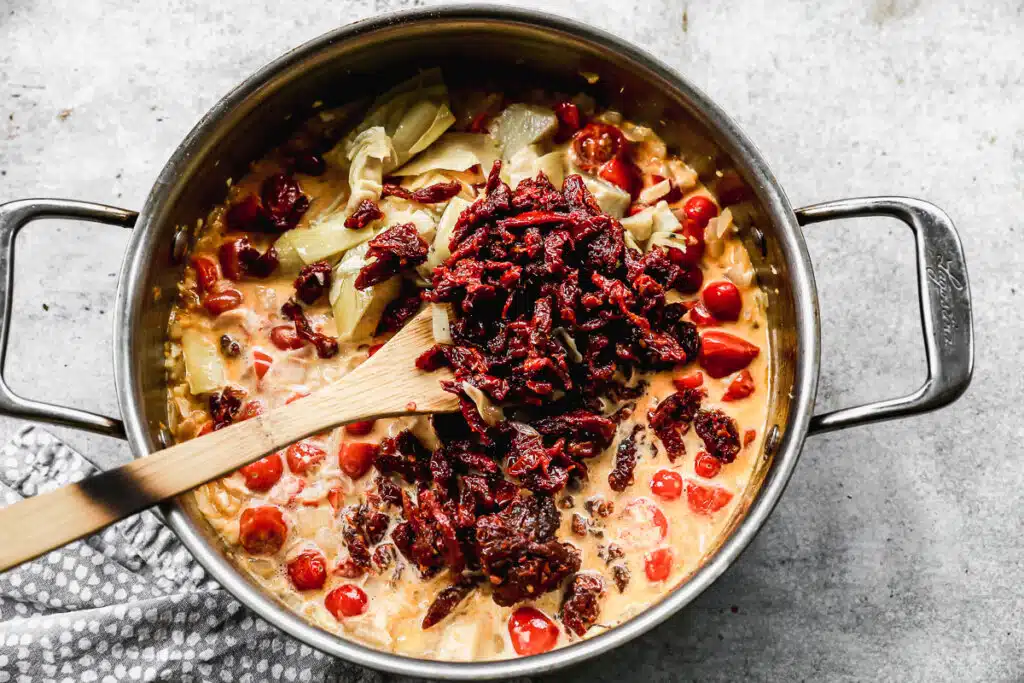 Sun-dried tomatoes and tomatoes in a white wine sauce