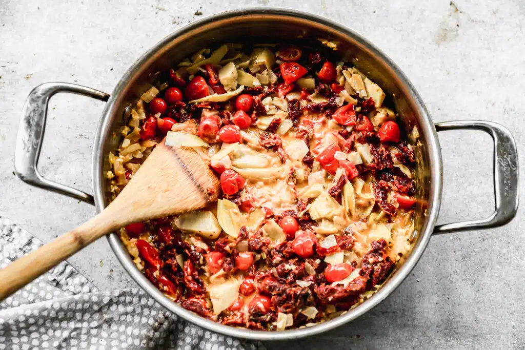 Sautéed cherry tomatoes, sun-dried tomatoes, artichokes and garlic in a creamy wine sauce.