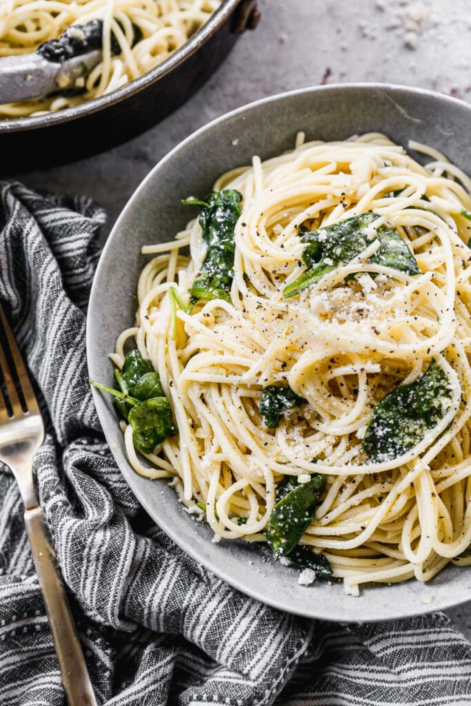 With just five ingredients Pasta Aglio e Olio is a shining star in the simple pasta realm. Each garlic and parmesan packed bite is a step closer to aldente pasta heaven!