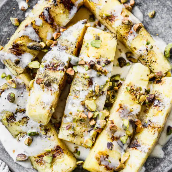 In the height of summer, dessert calls for a killer Grilled Pineapple Recipe. This easy dessert requires minimal effort, it's something that won't weigh us down -not so eloquently put - freaking delicious.