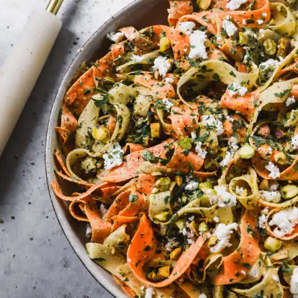 Buttery pistachio and mint pesto, creamy goat cheese and paper-thin shaved carrots are the makings of our new favorite way to do summer veggies - a Raw Carrot Salad. We are simply obsessed with this crunchy, herbaceous, tangy totally delightful side dish.