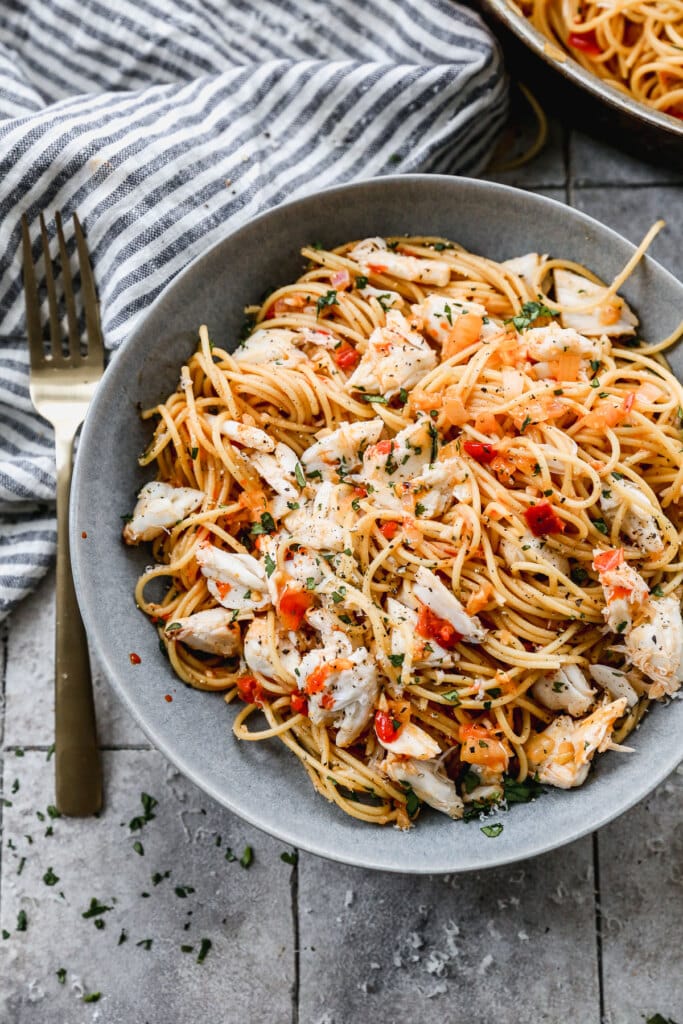 Crab Spaghetti with Calabrian Chili Butter Sauce is spicy, delicate and infinitely easy to throw together. Perfect for date night in!