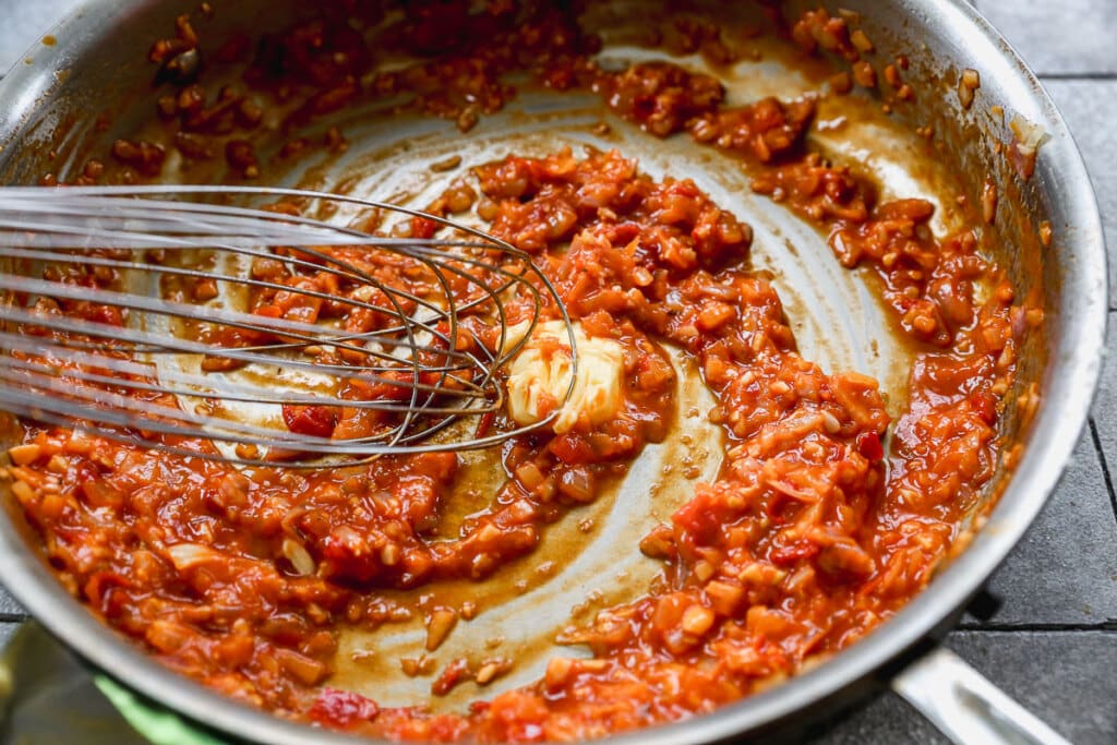 Spicy Calabrian chili sauce in a large skillet