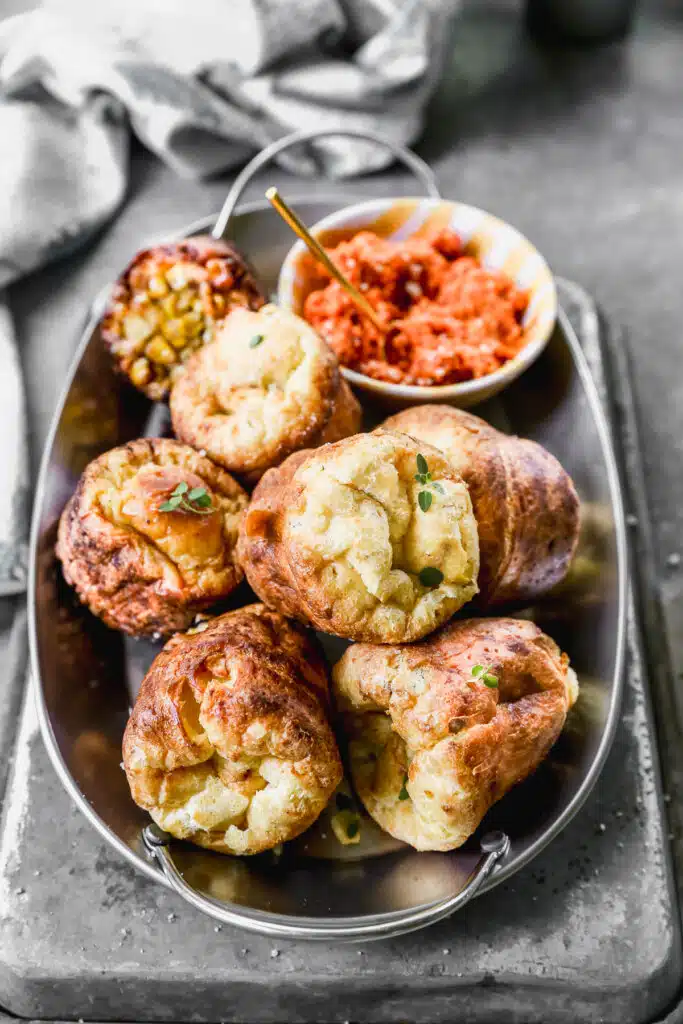With a fool-proof base and an adaptable filling mixture, the possibilites for our Easy Popover Recipe are endless. We stuff this one with crispy pancetta, aged gouda and sweet corn but the world is your oyster.