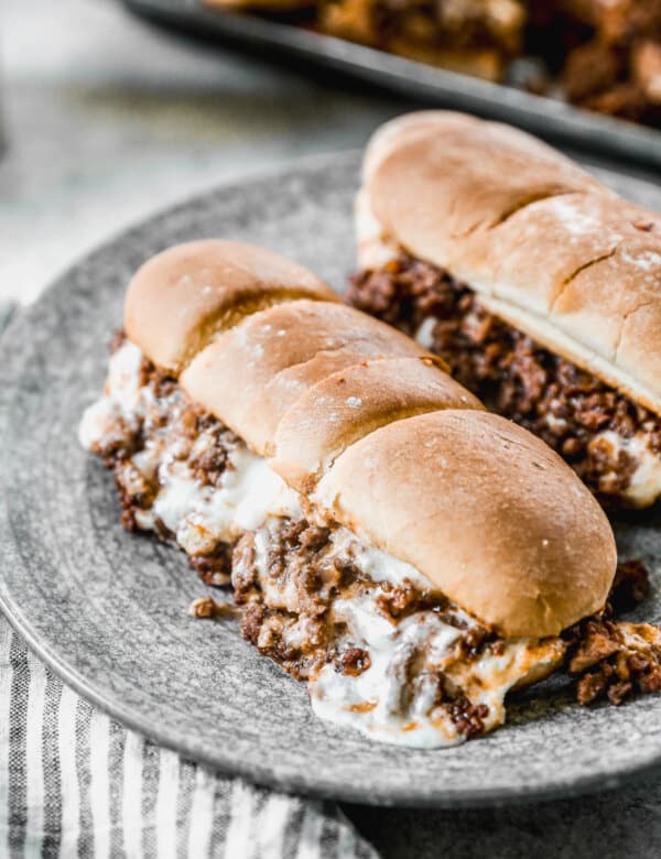 Stuffed to the brim with a hearty meat filling and then slathered with a gooey, cheesy mozzarella and ricotta mixture, this Lasagna Sandwich is your quick fix to a lasagna craving without all the fuss.