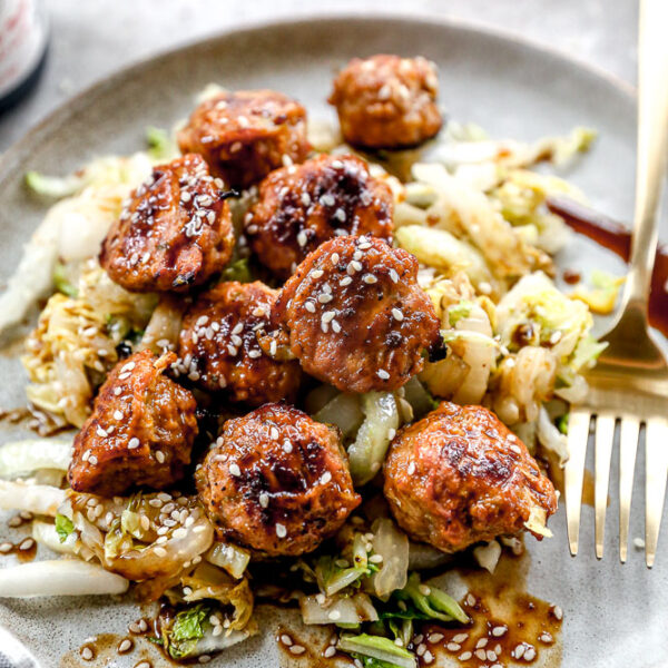 Let's make dumplings but skip the finicky part. And by finicky I mean, let's skip the dumpling altogether. These Chinese Meatballs transport the filling in a classic pork dumpling and turn in into a tender meatball fit for popping one after the other.