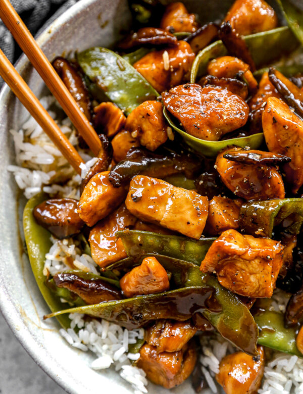 A quick and flavorful miso orange chicken made with tender chicken, shiitake mushrooms, and snow peas in a savory citrus glaze—perfect for an easy weeknight dinner over jasmine rice.